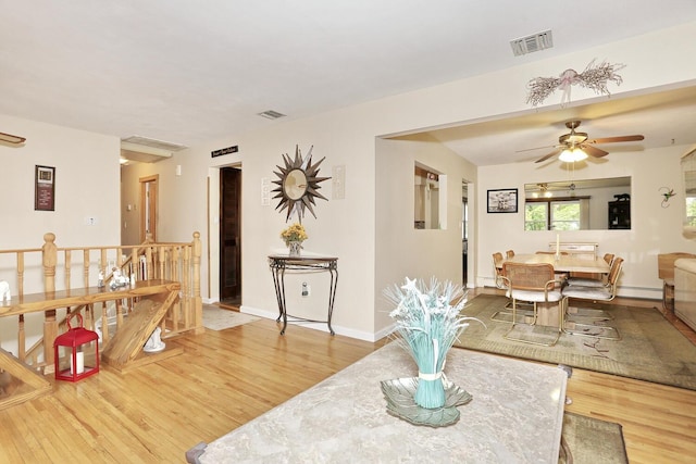 29 Park Ter, Valley Cottage, NY 10989 - living area featuring wood finished floors, ceiling fan, baseboards, and a baseboard radiator