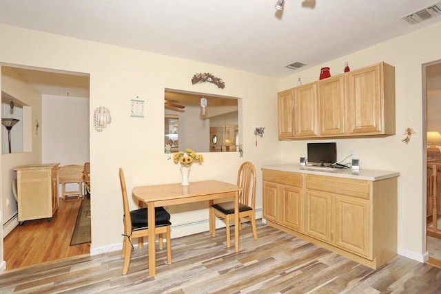 29 Park Ter, Valley Cottage, NY 10989 - dining space with light wood finished floors and baseboards