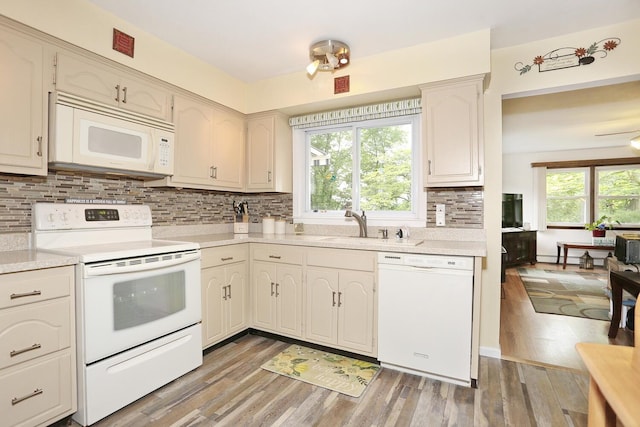29 Park Ter, Valley Cottage, NY 10989 - kitchen with white appliances, a sink, light countertops, and light wood-style floors