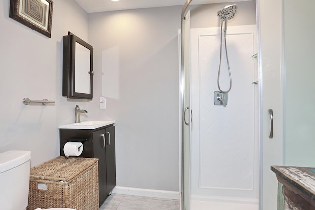 29 Park Ter, Valley Cottage, NY 10989 - bathroom featuring a shower stall, toilet, vanity, and tile patterned flooring