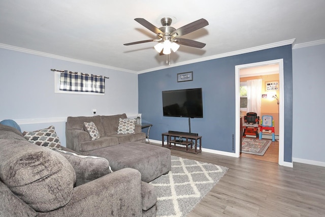 29 Park Ter, Valley Cottage, NY 10989 - living room with wood finished floors, baseboards, ceiling fan, and crown molding