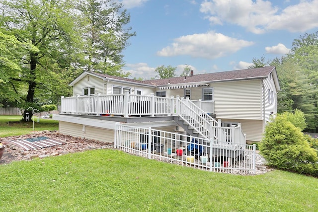 29 Park Ter, Valley Cottage, NY 10989 - rear view of house with a wooden deck, stairway, and a lawn