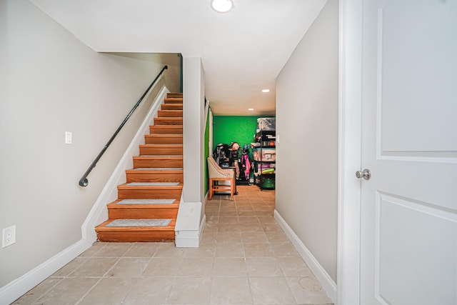 stairs with recessed lighting, tile patterned floors, and baseboards