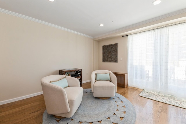 260 W Broadway Unit 2B, Long Beach, NY 11561 - living area featuring ornamental molding, wood finished floors, baseboards, and recessed lighting