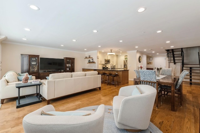 260 W Broadway Unit 2B, Long Beach, NY 11561 - living room with ornamental molding, recessed lighting, and light wood-type flooring