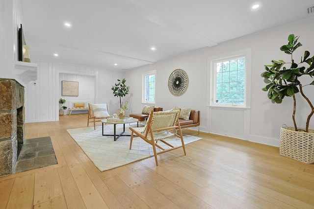 92 Glenwood Ave, New Rochelle, NY 10801 - living area featuring a fireplace with flush hearth, light wood finished floors, and recessed lighting