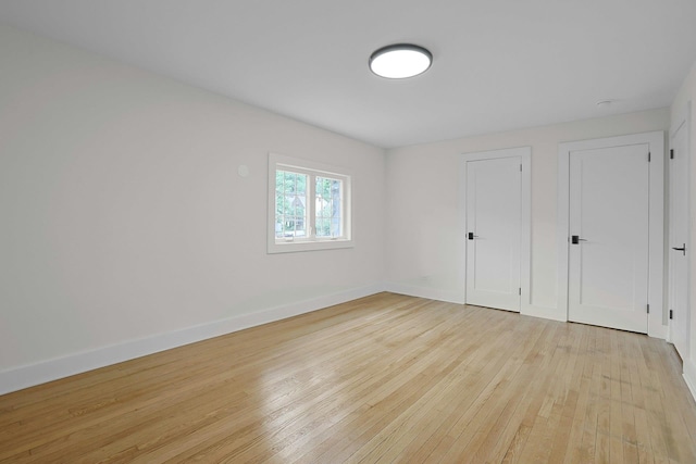 92 Glenwood Ave, New Rochelle, NY 10801 - unfurnished bedroom featuring light wood-style floors and baseboards