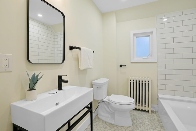 92 Glenwood Ave, New Rochelle, NY 10801 - full bath featuring radiator heating unit, vanity, and tile patterned floors