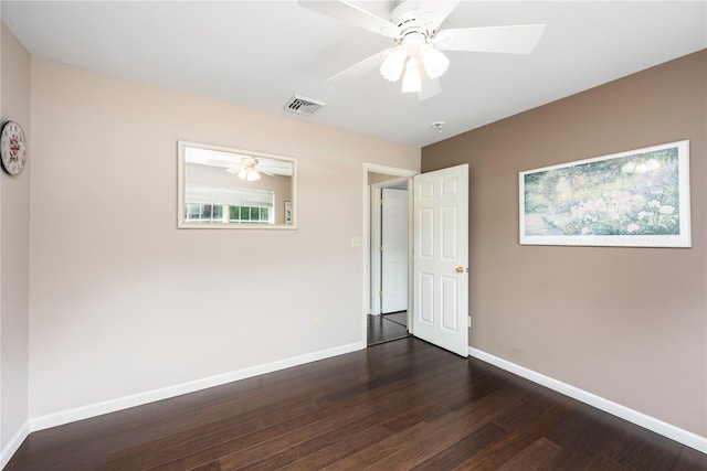 84 Autumn Dr, Poughkeepsie, NY 12603 - unfurnished bedroom featuring baseboards and dark wood-style floors