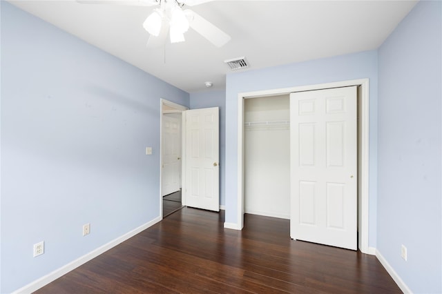 84 Autumn Dr, Poughkeepsie, NY 12603 - unfurnished bedroom with dark wood-style floors, baseboards, a closet, and a ceiling fan
