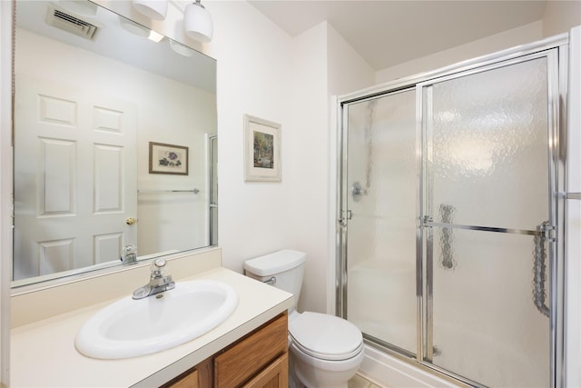 84 Autumn Dr, Poughkeepsie, NY 12603 - bathroom featuring vanity, a stall shower, and toilet
