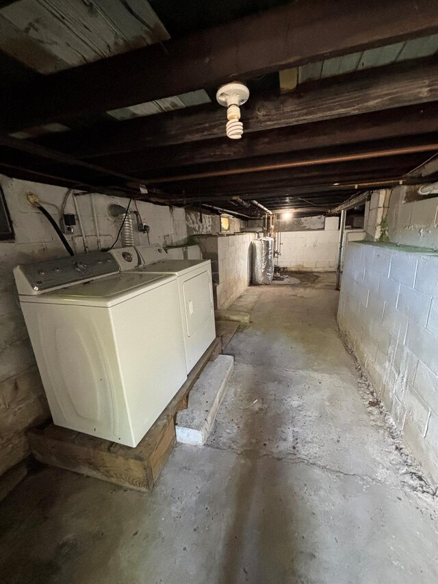212 Longfellow Dr, Mastic Beach, NY 11951 - unfinished below grade area featuring washing machine and clothes dryer