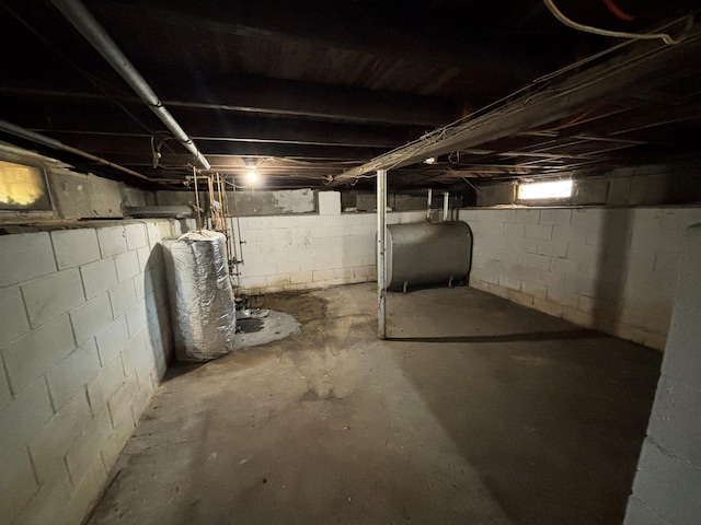 212 Longfellow Dr, Mastic Beach, NY 11951 - unfinished below grade area featuring heating fuel and water heater