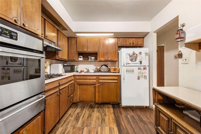 71-34 Kissena Blvd, Flushing, NY 11367 - kitchen with stainless steel appliances, a warming drawer, open shelves, dark wood-type flooring, and light countertops