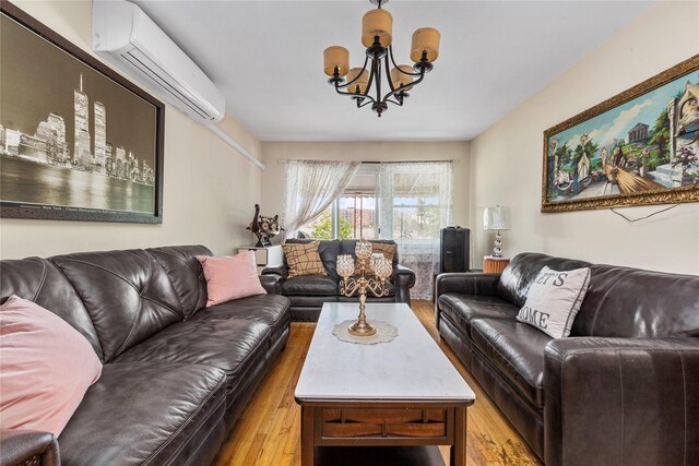 71-34 Kissena Blvd, Flushing, NY 11367 - living room with a wall mounted AC, light wood-style floors, and a chandelier