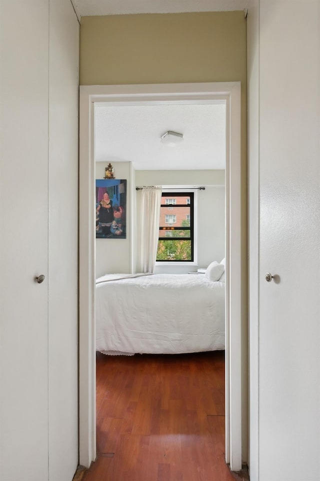39-60 54th St Unit 3B, Woodside, NY 11377 - hall with dark wood-style flooring