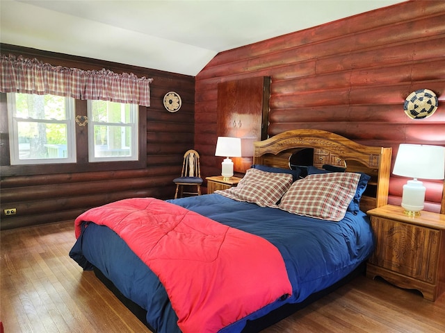 45 W Kenoza Pl, Smallwood, NY 12778 - bedroom featuring rustic walls, wood finished floors, and lofted ceiling