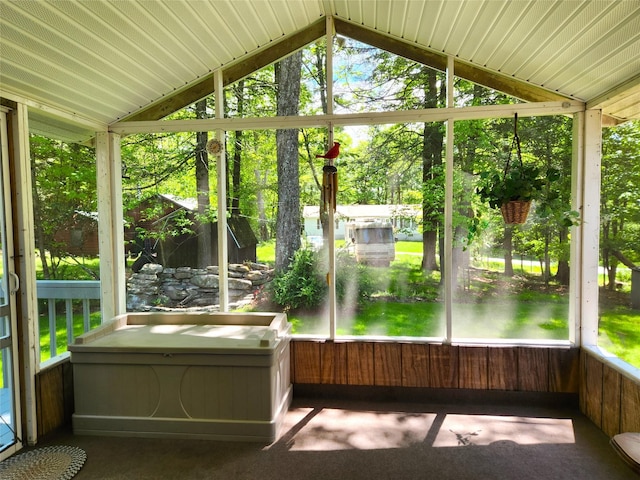 45 W Kenoza Pl, Smallwood, NY 12778 - unfurnished sunroom with lofted ceiling and view of wooded area
