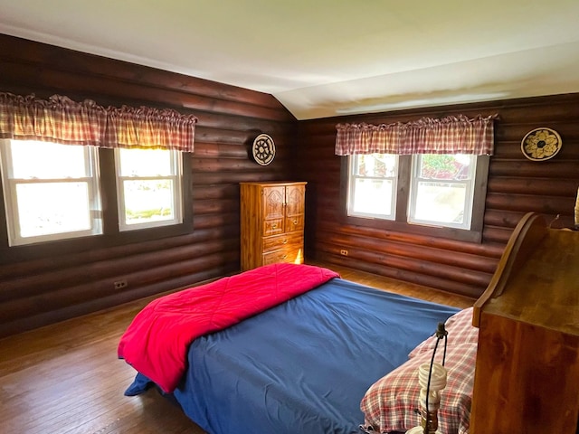 45 W Kenoza Pl, Smallwood, NY 12778 - bedroom with rustic walls, hardwood / wood-style flooring, and vaulted ceiling