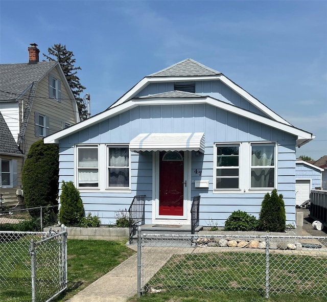 47 Harding Ave, Hicksville, NY 11801 - view of front of house with board and batten siding and roof with shingles