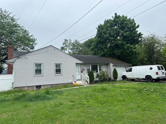 182 New York Ave, Bay Shore, NY 11706 - view of front facade with an attached garage, a front lawn, and a chimney
