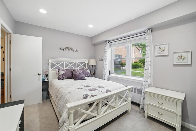 135 Highland Ave S Unit D1, Ossining, NY 10562 - bedroom featuring light carpet, recessed lighting, and radiator