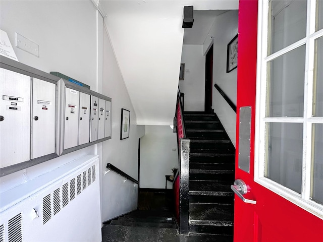 stairs with mail area and radiator