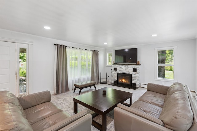 21 Wagon Ln, Brewster, NY 10509 - living area featuring a baseboard radiator, plenty of natural light, light wood finished floors, a fireplace, and recessed lighting