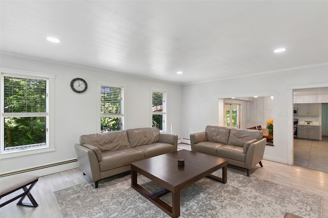 21 Wagon Ln, Brewster, NY 10509 - living room featuring healthy amount of natural light, light wood-type flooring, recessed lighting, ornamental molding, and a baseboard radiator