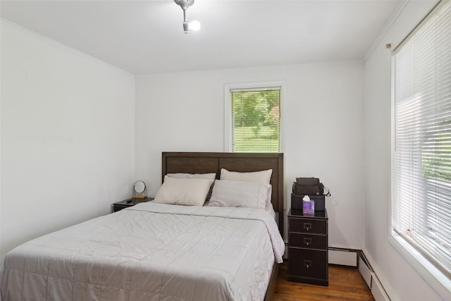 21 Wagon Ln, Brewster, NY 10509 - bedroom featuring wood finished floors, ornamental molding, and a baseboard radiator