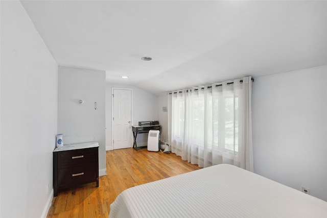 21 Wagon Ln, Brewster, NY 10509 - bedroom featuring light wood finished floors, baseboards, vaulted ceiling, and recessed lighting