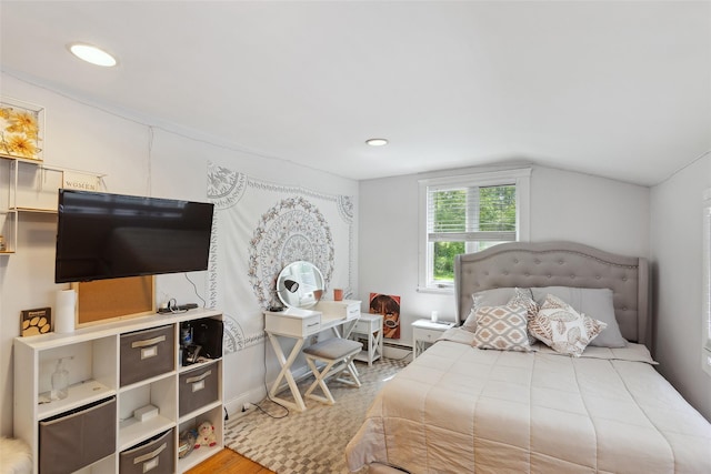 21 Wagon Ln, Brewster, NY 10509 - bedroom featuring wood finished floors, vaulted ceiling, recessed lighting, and baseboards