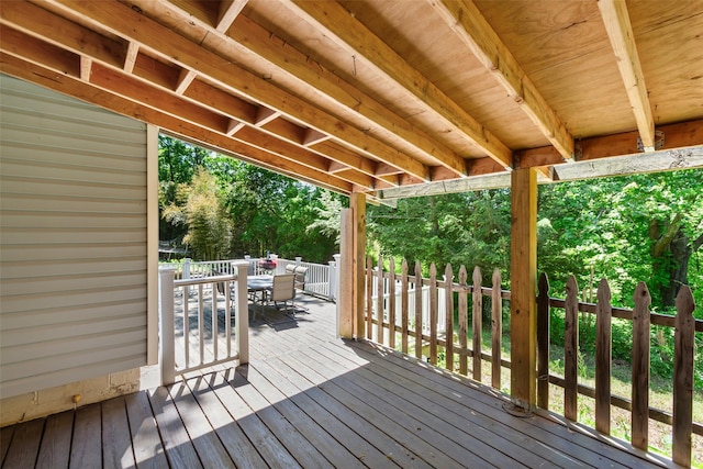 21 Wagon Ln, Brewster, NY 10509 - wooden terrace with outdoor dining area and view of wooded area