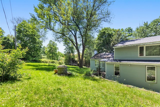 21 Wagon Ln, Brewster, NY 10509 - view of green lawn with a fire pit