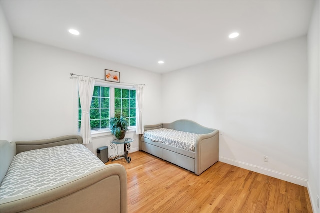 1 Pitch Pine Ct, Northport, NY 11768 - bedroom with baseboards, light wood finished floors, and recessed lighting
