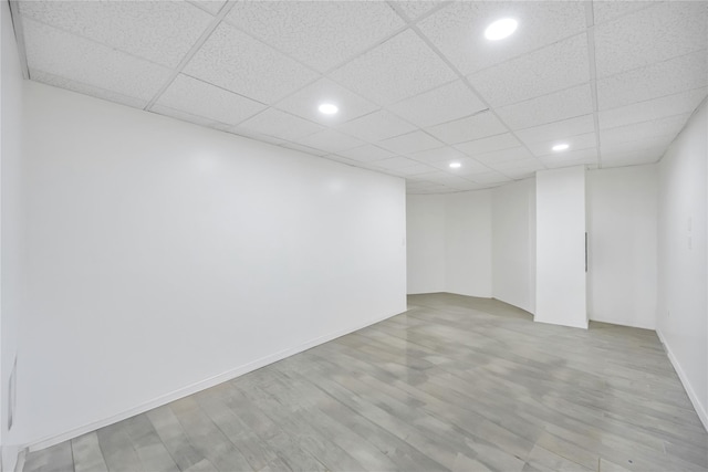 1 Pitch Pine Ct, Northport, NY 11768 - unfurnished room featuring light wood-style flooring, recessed lighting, and a drop ceiling