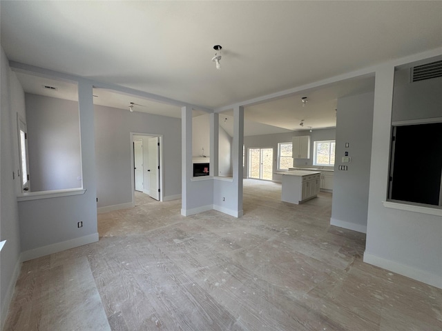 40 Wells Rd, Newburgh, NY 12550 - unfurnished living room featuring baseboards