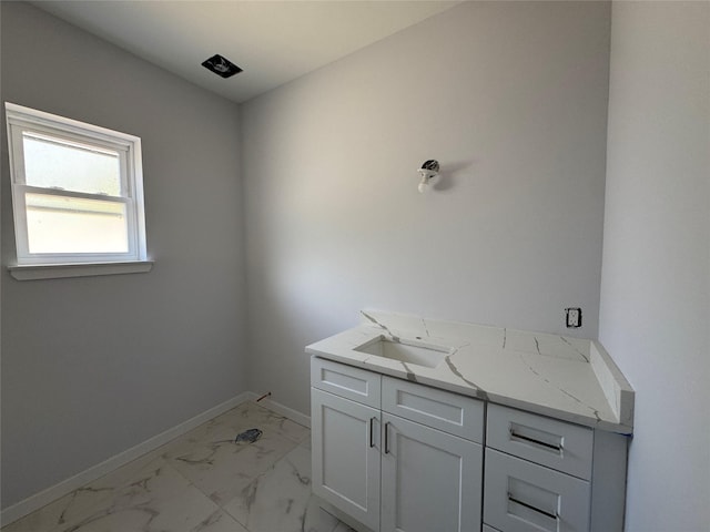 40 Wells Rd, Newburgh, NY 12550 - bathroom featuring marble finish flooring, baseboards, and vanity