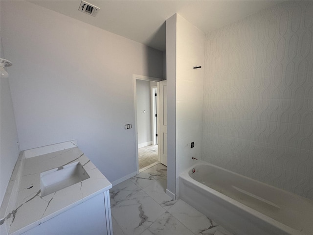 40 Wells Rd, Newburgh, NY 12550 - bathroom featuring marble finish floors, shower / tub combination, baseboards, and vanity
