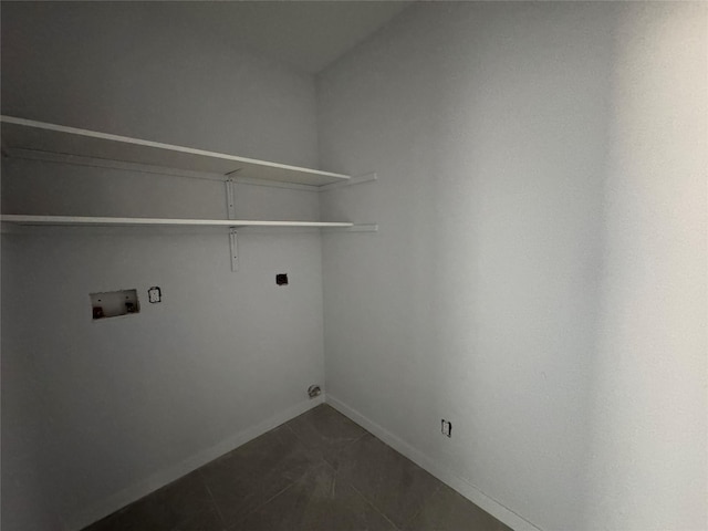 40 Wells Rd, Newburgh, NY 12550 - washroom with washer hookup, baseboards, dark tile patterned floors, and electric dryer hookup
