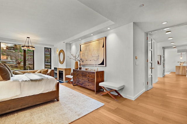 212 E 95th St, New York Manhattan, NY 10128 - bedroom featuring light wood-style flooring, baseboards, and recessed lighting