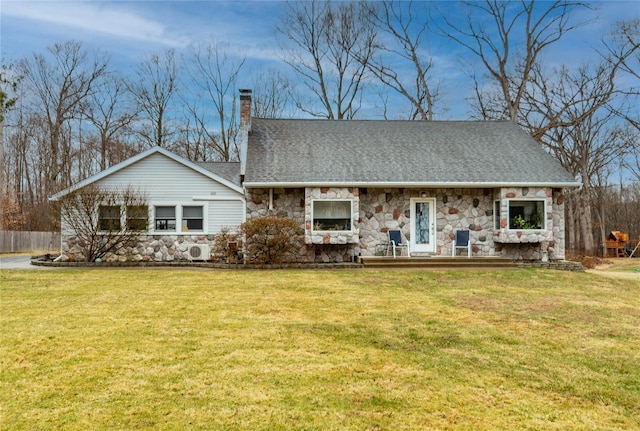 129 Boardman Rd, Poughkeepsie, NY 12603 - back of house with stone siding, a chimney, and a shingled roof