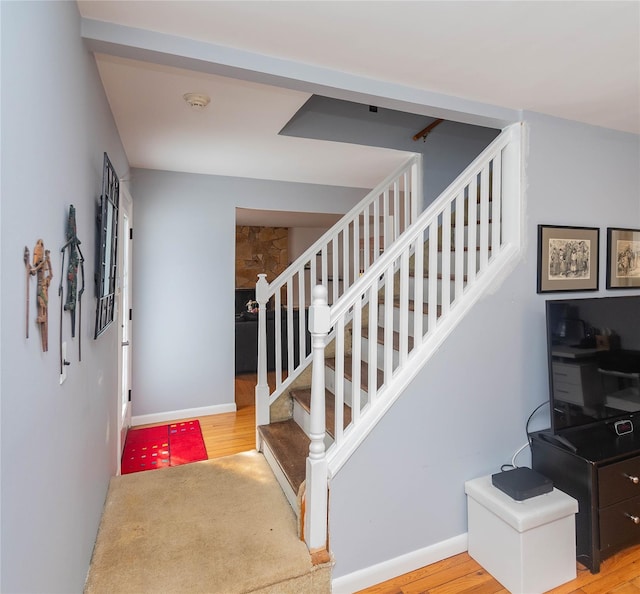 129 Boardman Rd, Poughkeepsie, NY 12603 - staircase featuring wood finished floors and baseboards