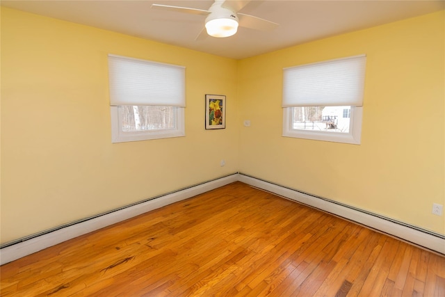 129 Boardman Rd, Poughkeepsie, NY 12603 - empty room featuring plenty of natural light, wood-type flooring, and a ceiling fan