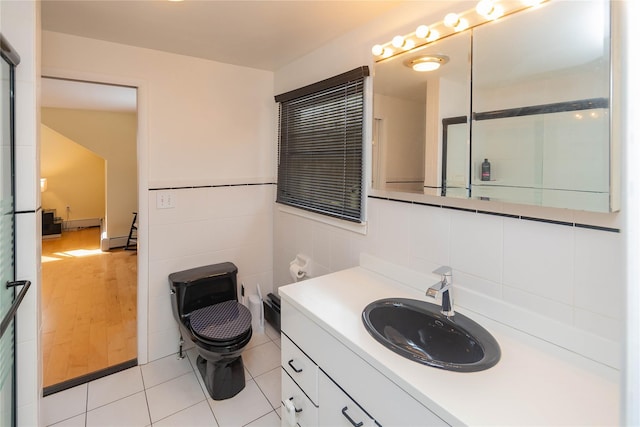 129 Boardman Rd, Poughkeepsie, NY 12603 - bathroom featuring vanity, tile patterned floors, toilet, and backsplash