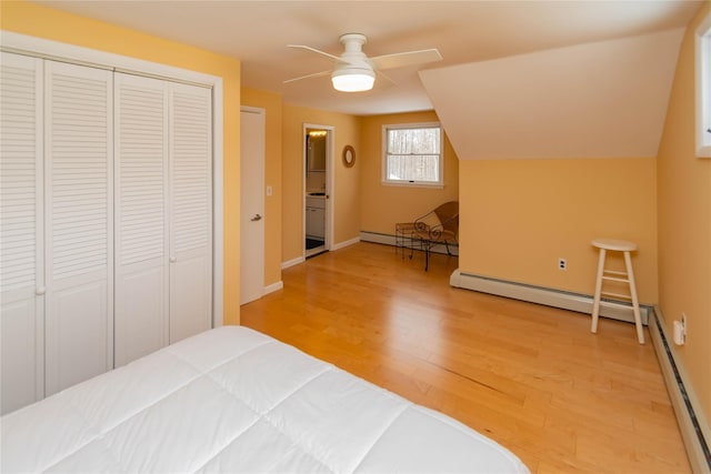 129 Boardman Rd, Poughkeepsie, NY 12603 - bedroom featuring light wood-style floors, a closet, a baseboard radiator, and ceiling fan