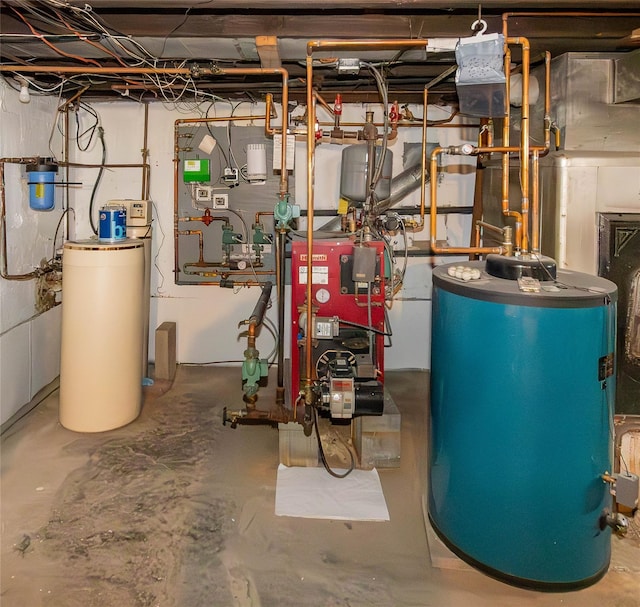 129 Boardman Rd, Poughkeepsie, NY 12603 - utility room with water heater and a heating unit