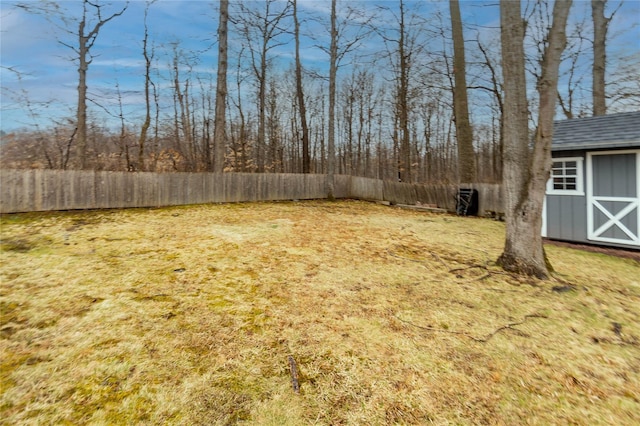 129 Boardman Rd, Poughkeepsie, NY 12603 - fenced backyard featuring a shed and an outbuilding