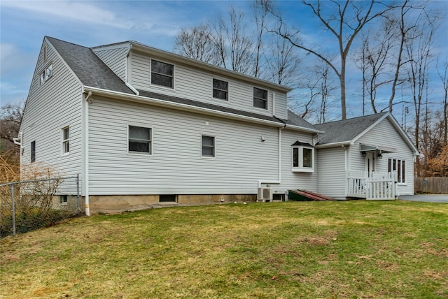 129 Boardman Rd, Poughkeepsie, NY 12603 - rear view of property with central air condition unit and a shingled roof