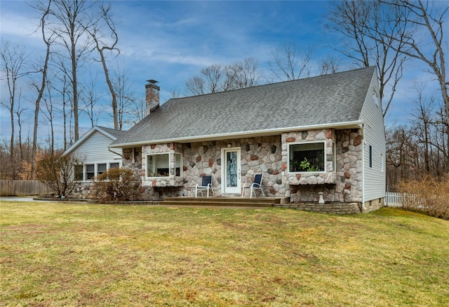 129 Boardman Rd, Poughkeepsie, NY 12603 - view of front of home featuring stone siding, a chimney, and roof with shingles